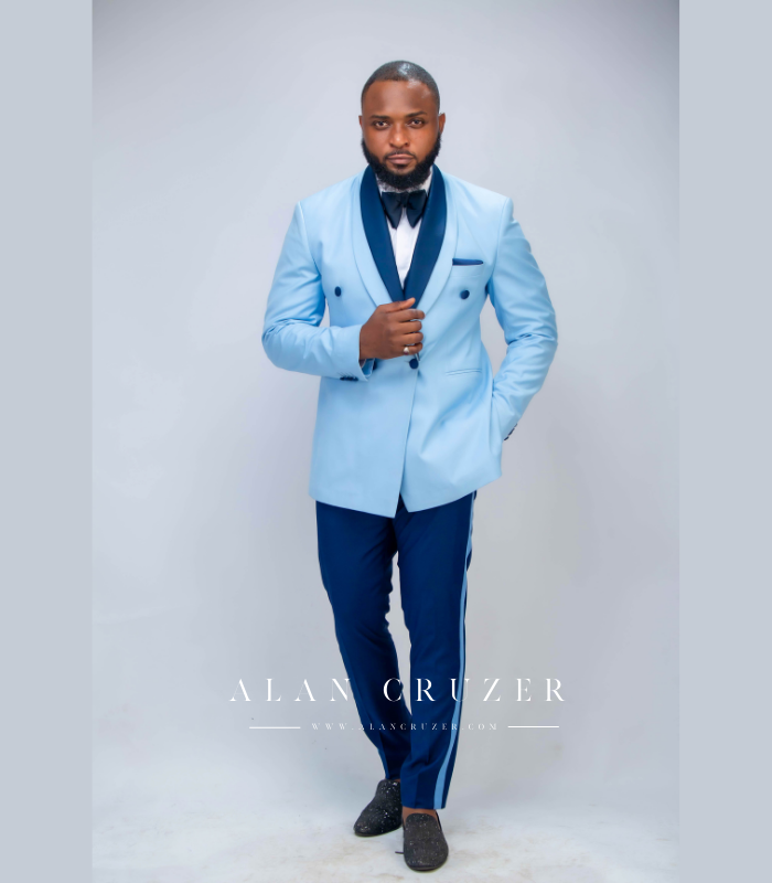 Tiered barathea fabric flows over this two-tone wedding suit for grooms, bringing a modern look to an iconic style. A satin-polyester blend with a subtle two-tone pattern, this suit is fully lined and features a matching vest with a single button.